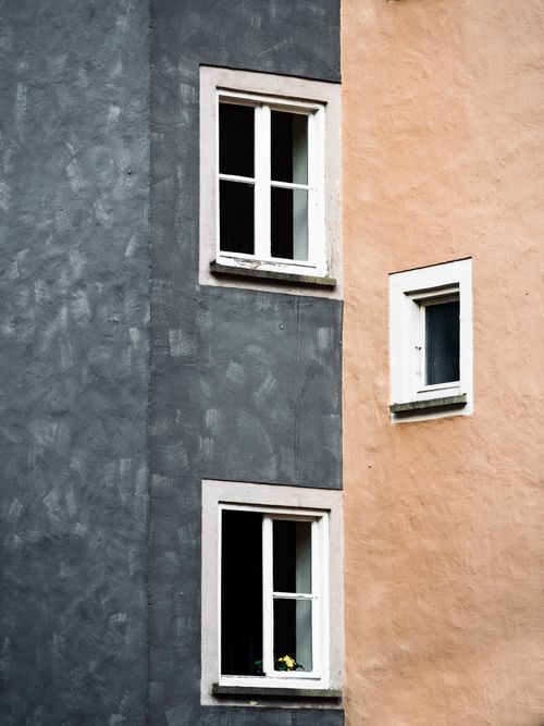 Free A close-up of contrasting building facades with windows in Augsburg, Germany. Stock Photo
