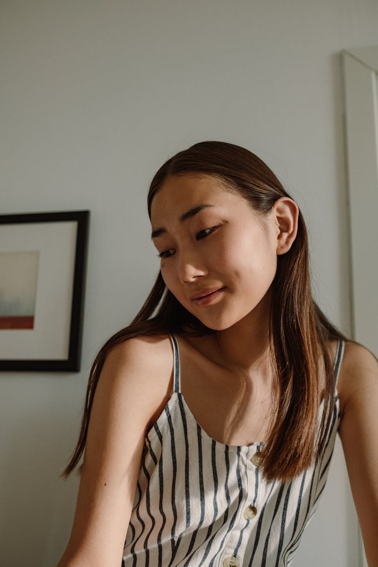 Woman Wearing A Striped Tank Top