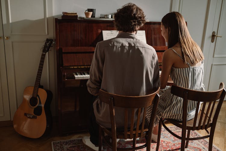 A Couple Playing Piano