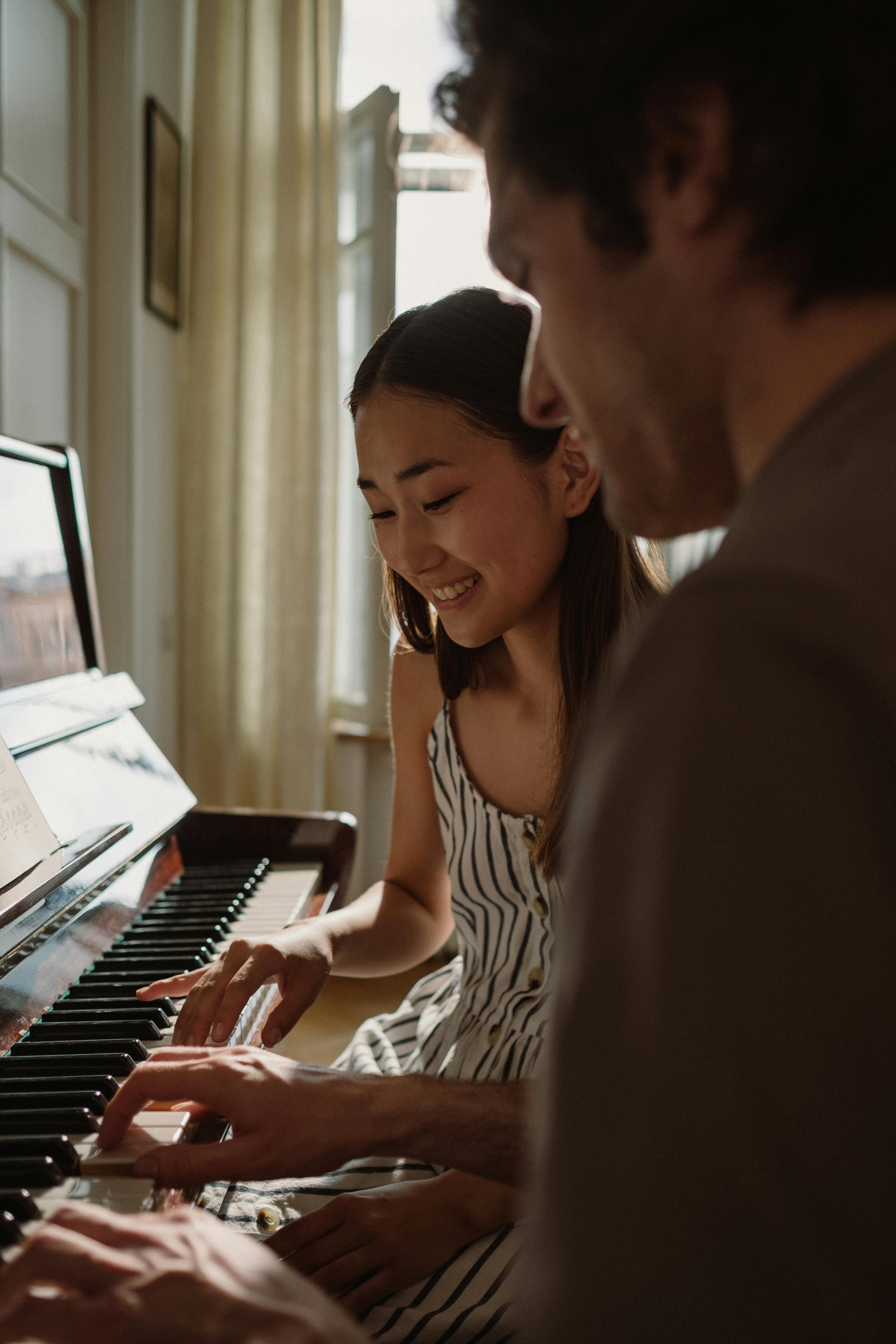 Free stock photo of adult, child, classical music Stock Photo