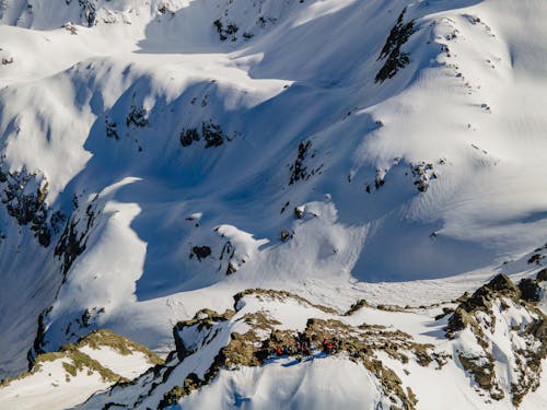 Бесплатное стоковое фото с Аэрофотосъемка, заснеженные горы, на открытом воздухе