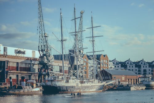 White and Black Ship on Dock