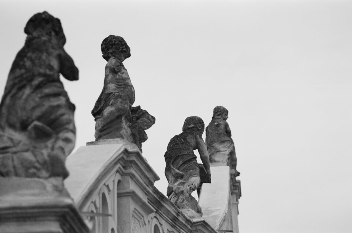 Black and White Photo of Sculptures