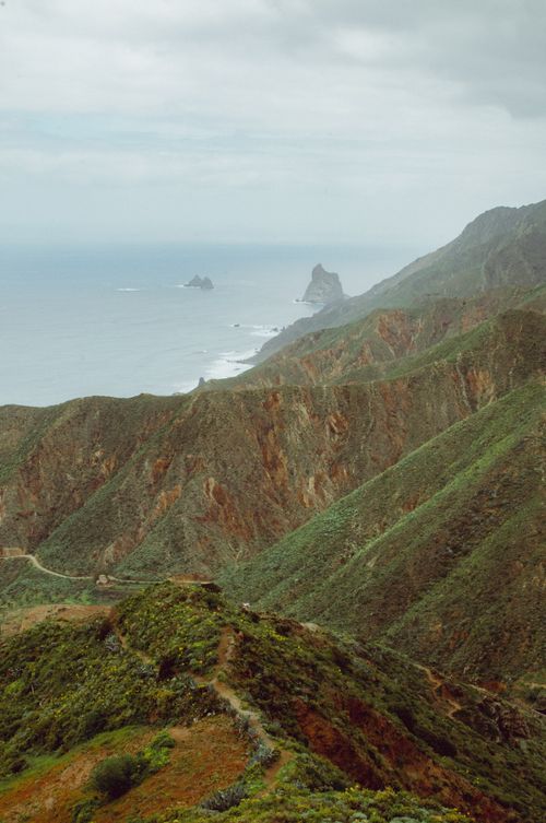 Free Stunning view of Anaga Mountains and the Atlantic Ocean under a cloudy sky in Tenerife, Spain. Stock Photo