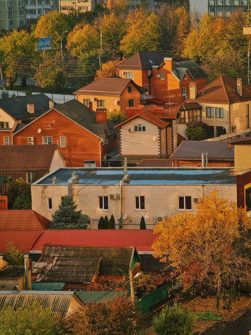 Free Aerial view of charming houses surrounded by autumn foliage in Moscow, Russia. Stock Photo