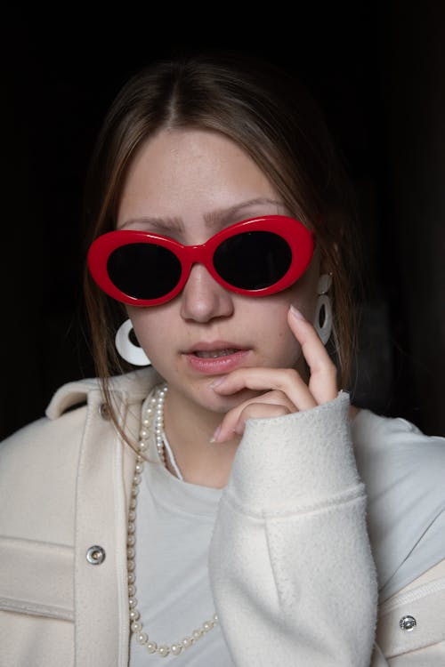 Woman Wearing Red Framed Sunglasses
