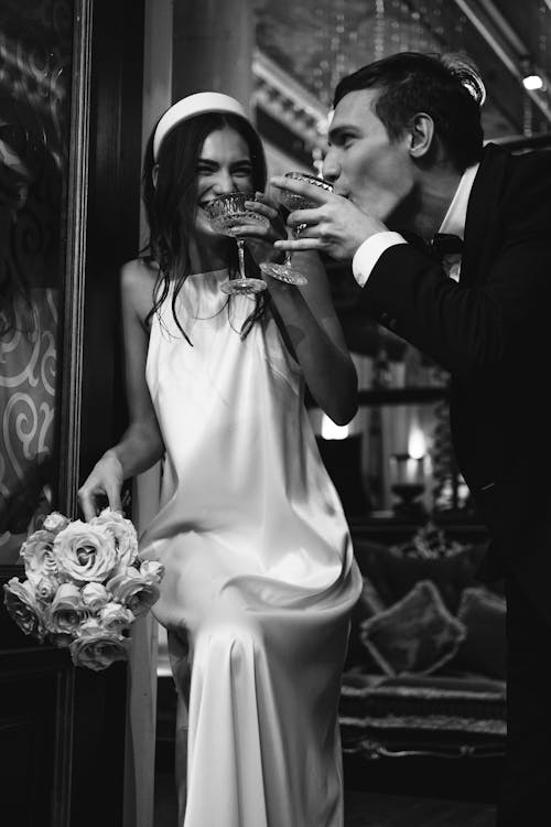 Free Bride and Groom Drinking Champagne  Stock Photo