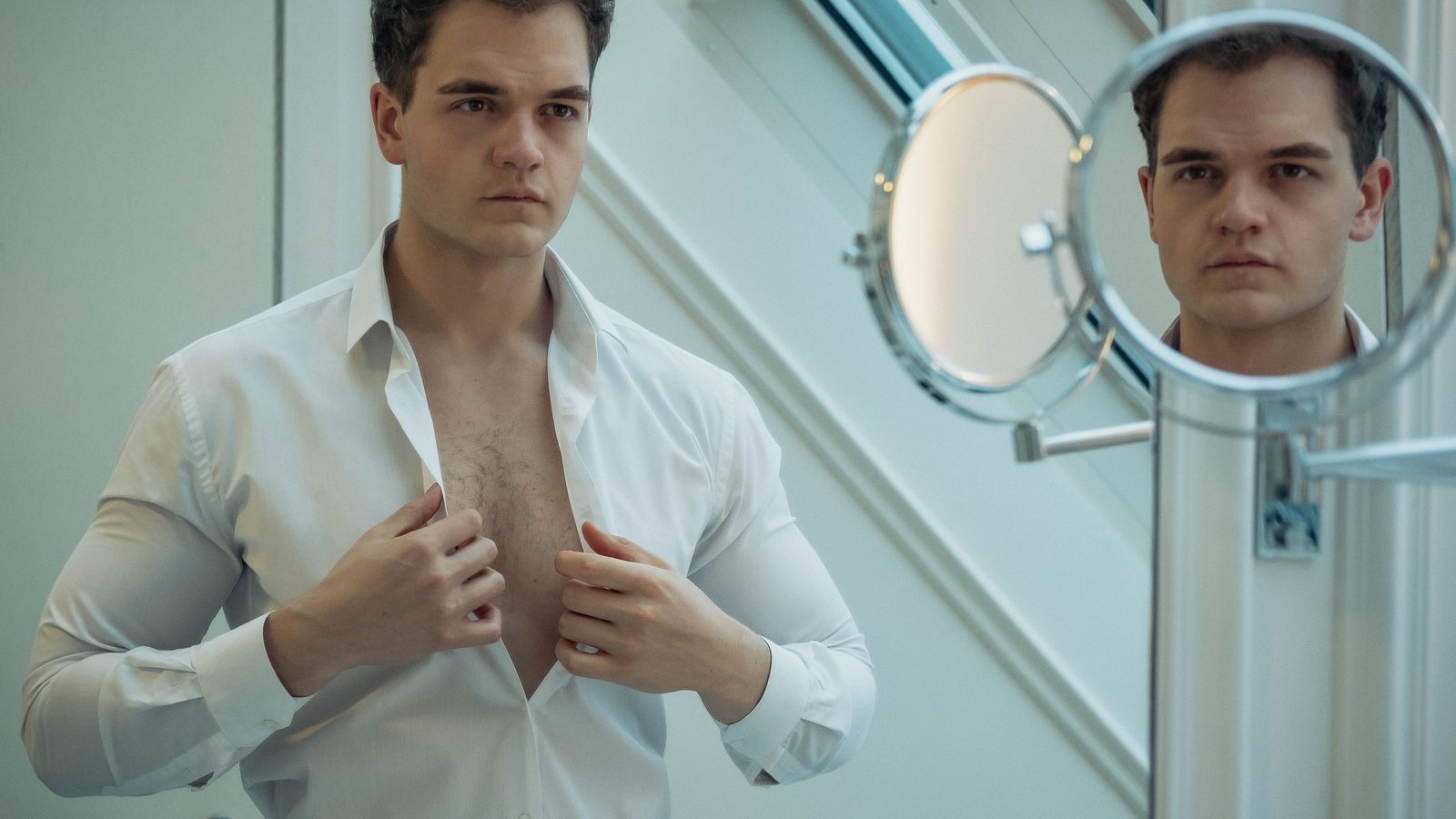 A man dressing with quiet confidence