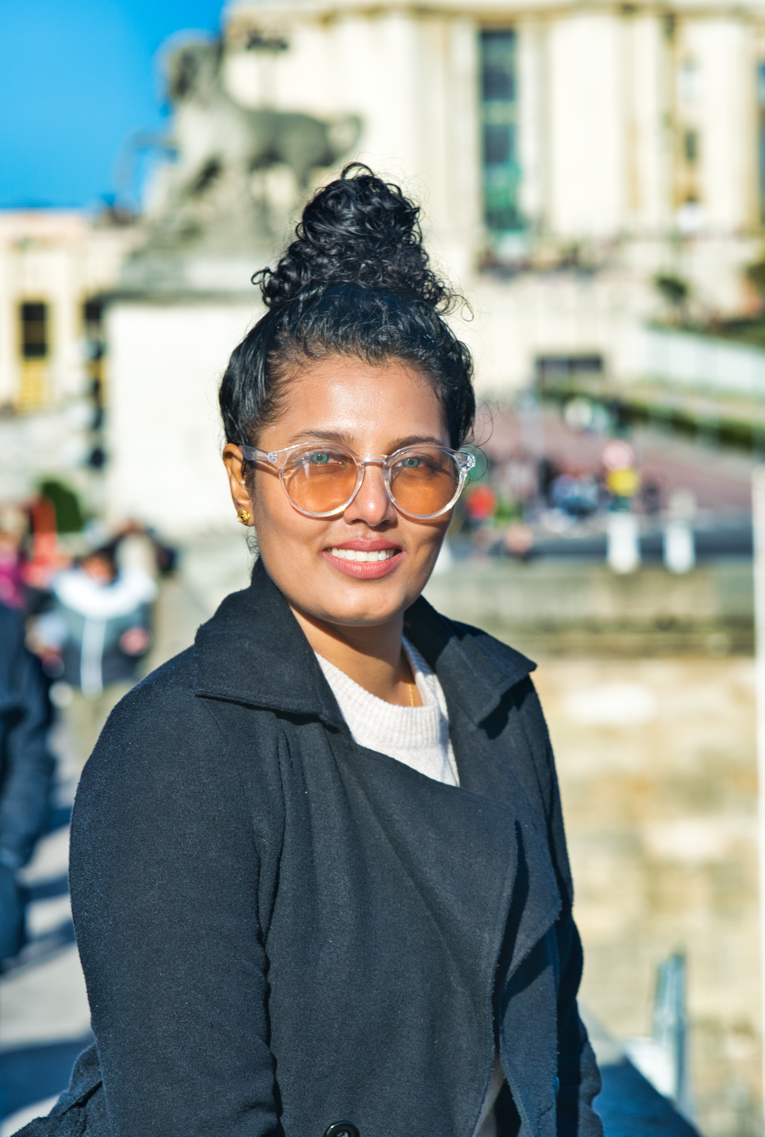 Woman in Black Coat Wearing Sunglasses · Free Stock Photo