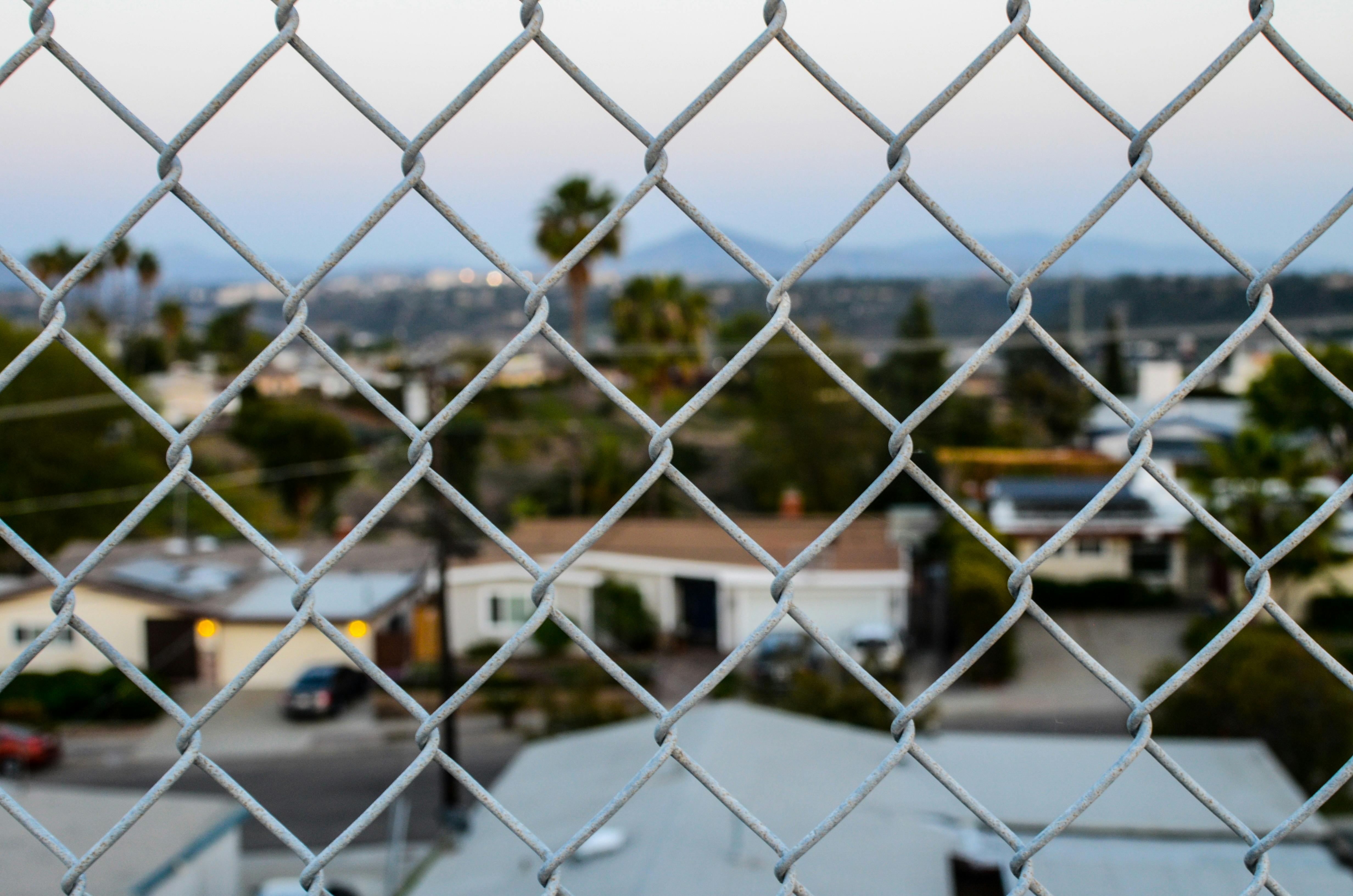 Gray Steel Cyclone Fence Free Stock Photo