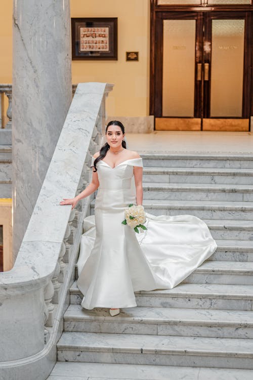 Free Bride Walking Down the Stairs Stock Photo