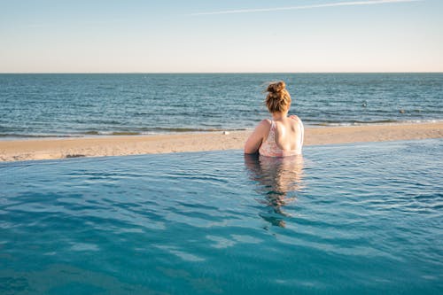 Woman in Blue Bikini in Water