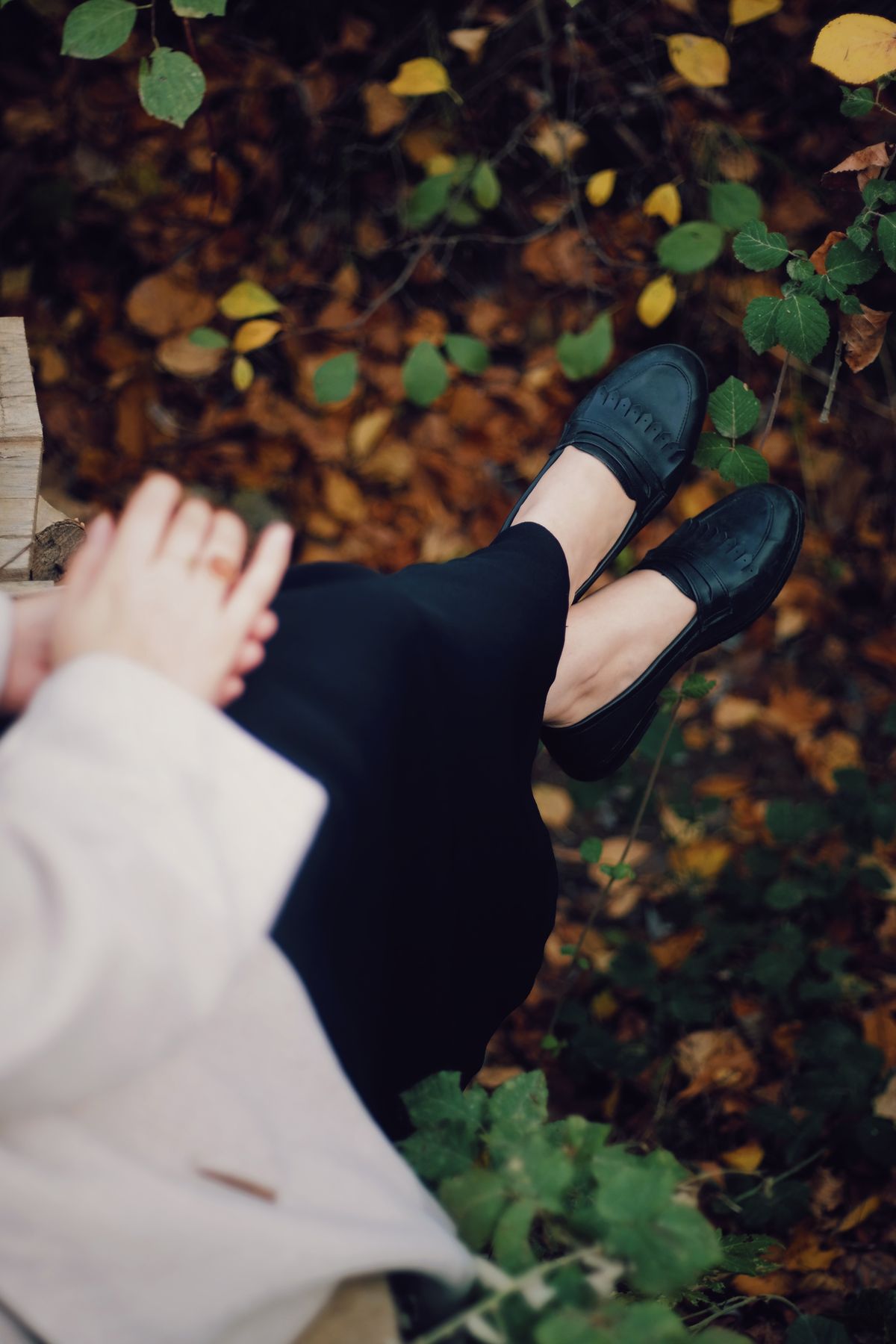 Person styled in loafers as a dressier shoe option
