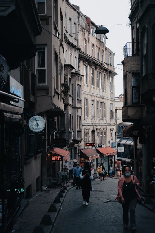 Free Urban street view in Istanbul's historic area showcasing diverse architecture and daily life. Stock Photo