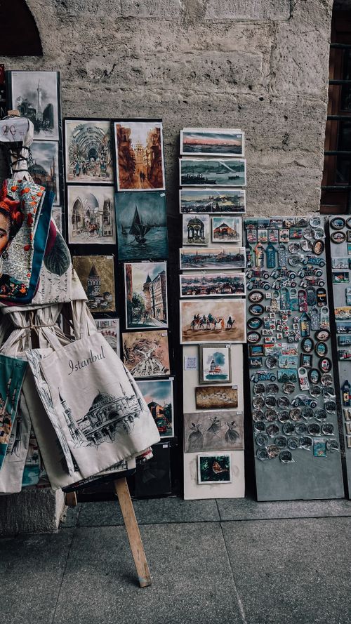Free Colorful street art and souvenirs displayed in a vibrant Istanbul market setting. Stock Photo
