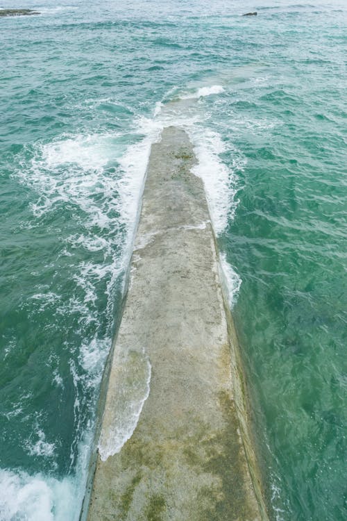 Free Gray Concrete in the Sea Stock Photo