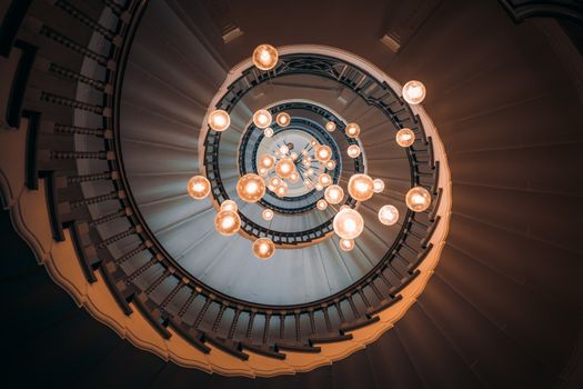 White and Gold Chandelier on Brown Ceiling