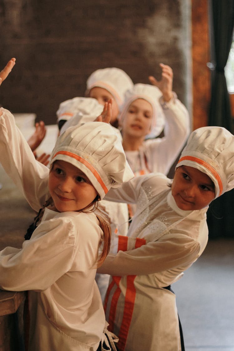 Little Girls Learning How To Cook 