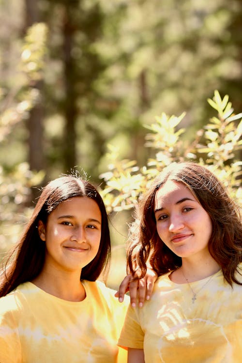 Two Teenage Girls Smiling