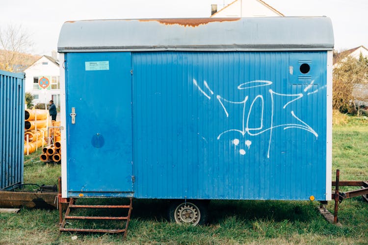 Blue Trailer On A Construction Site 