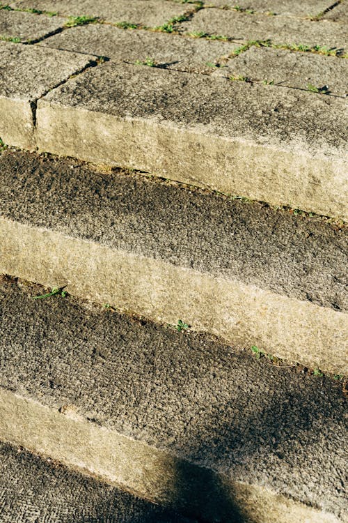 Rough Concrete Stairs in Close-Up Photography 