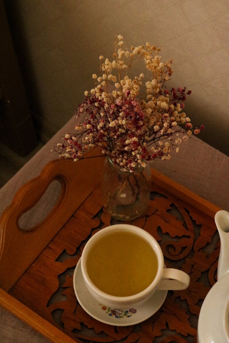 Coffee And Flowers In Vase