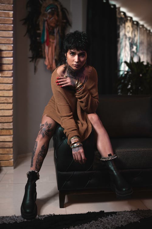 Woman With Tattoos Posing on a Street 
