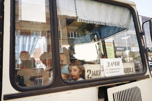 Free People Sitting Inside a Bus Stock Photo