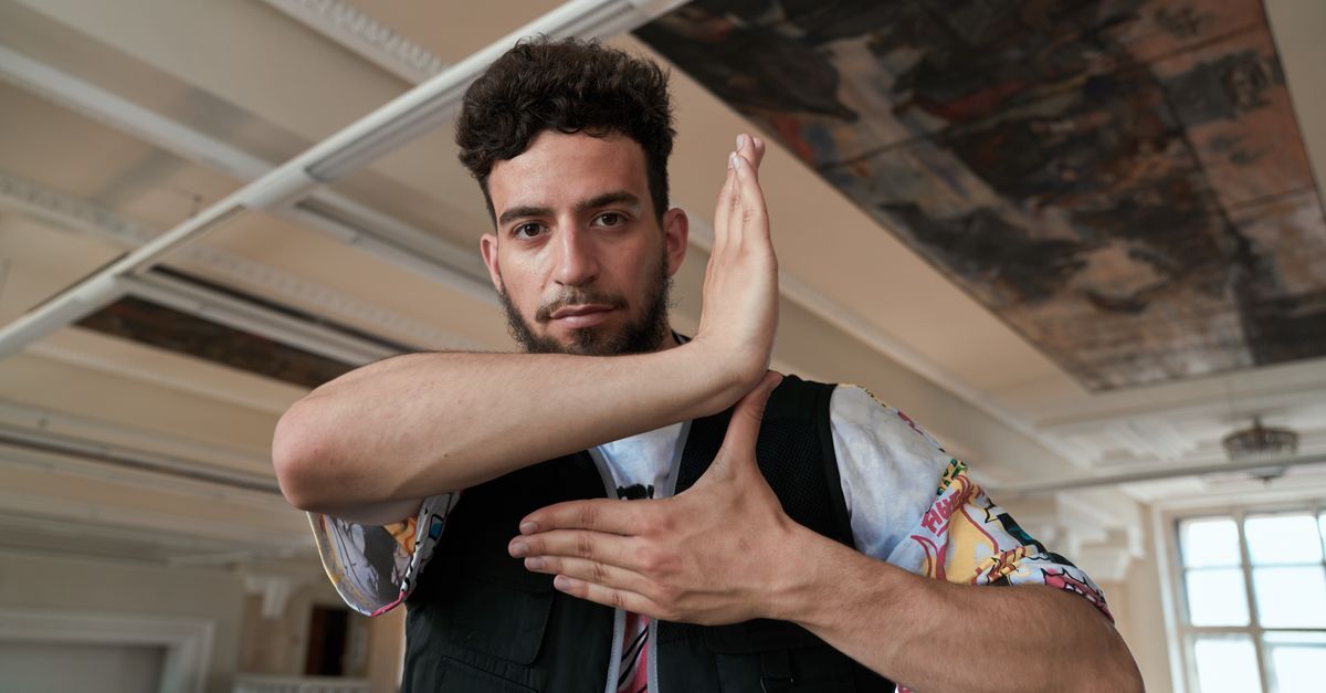 A Man doing a Finger-Tutting Dance · Free Stock Photo