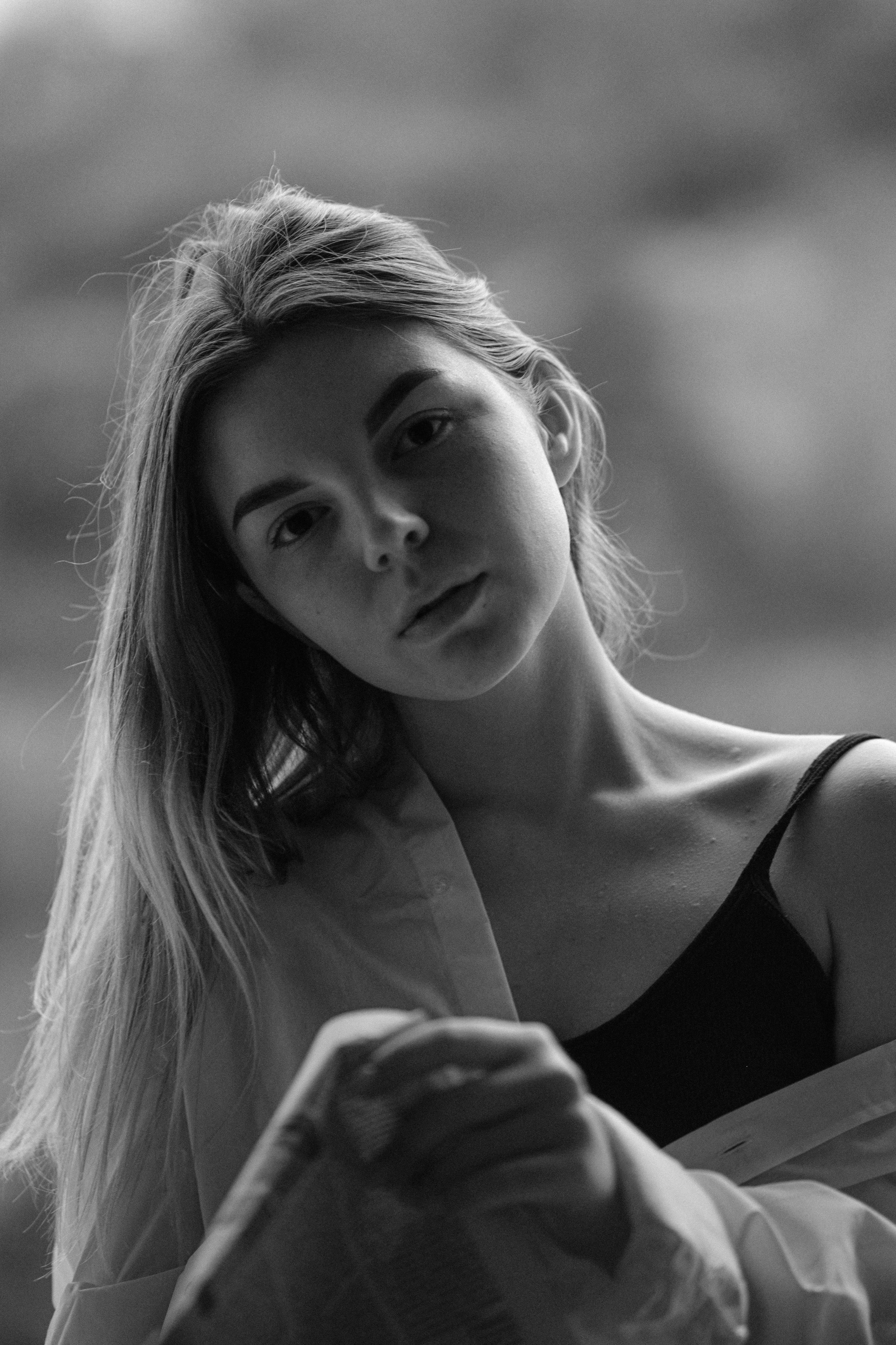 Woman Wearing a Black Tank Top Under a Long Sleeve Shirt · Free Stock Photo