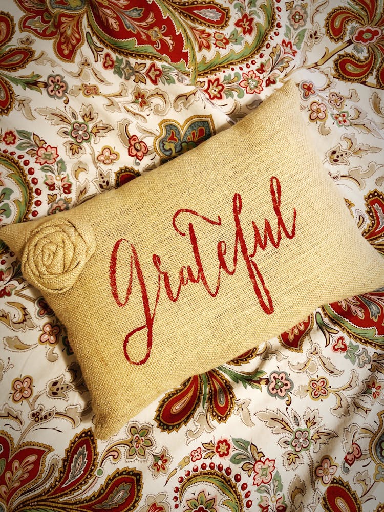 Grateful Text Printed On A Pillow