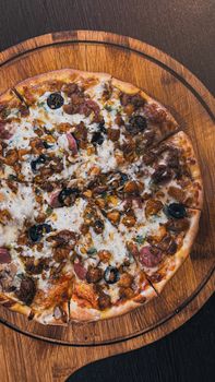 From Restaurant Or Thick Crust Pizza With Meat And Vegetables