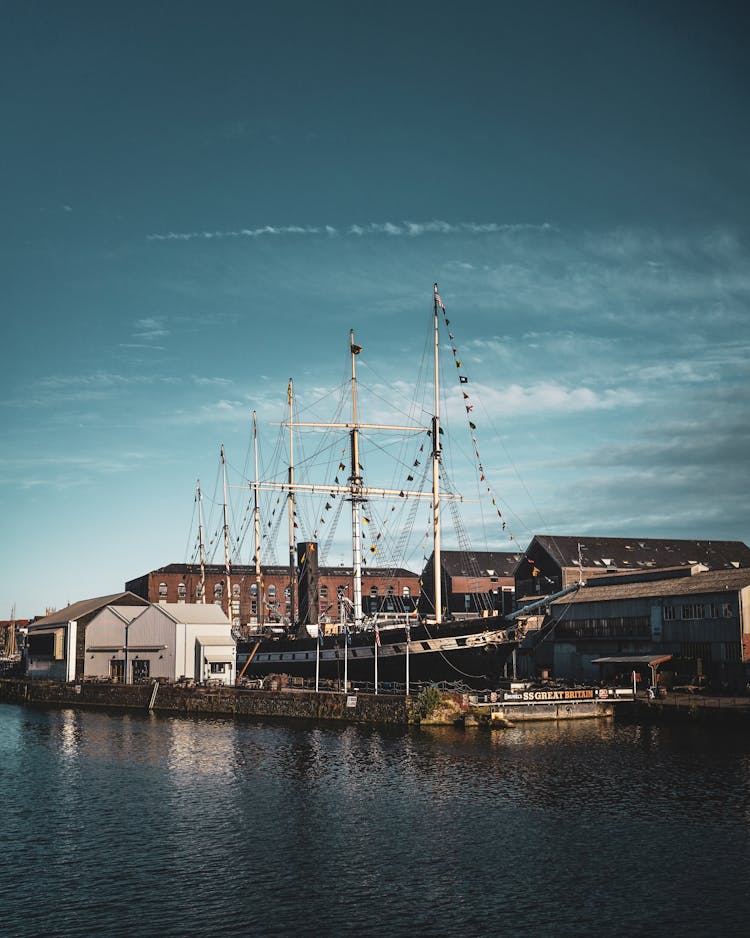 Ship With Masts In Harbor