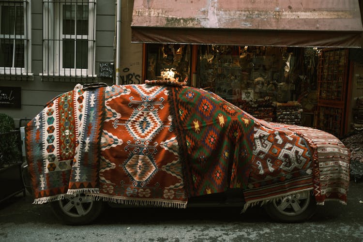 Car Covered With Blankets