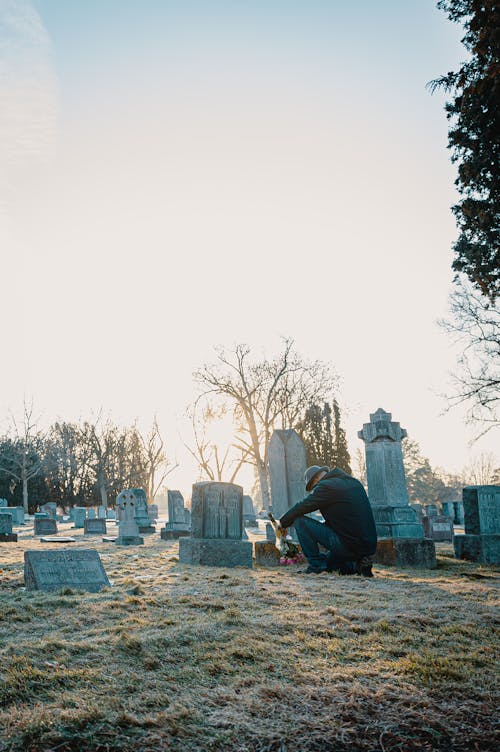 Free Sad Man in a Cemetery Stock Photo