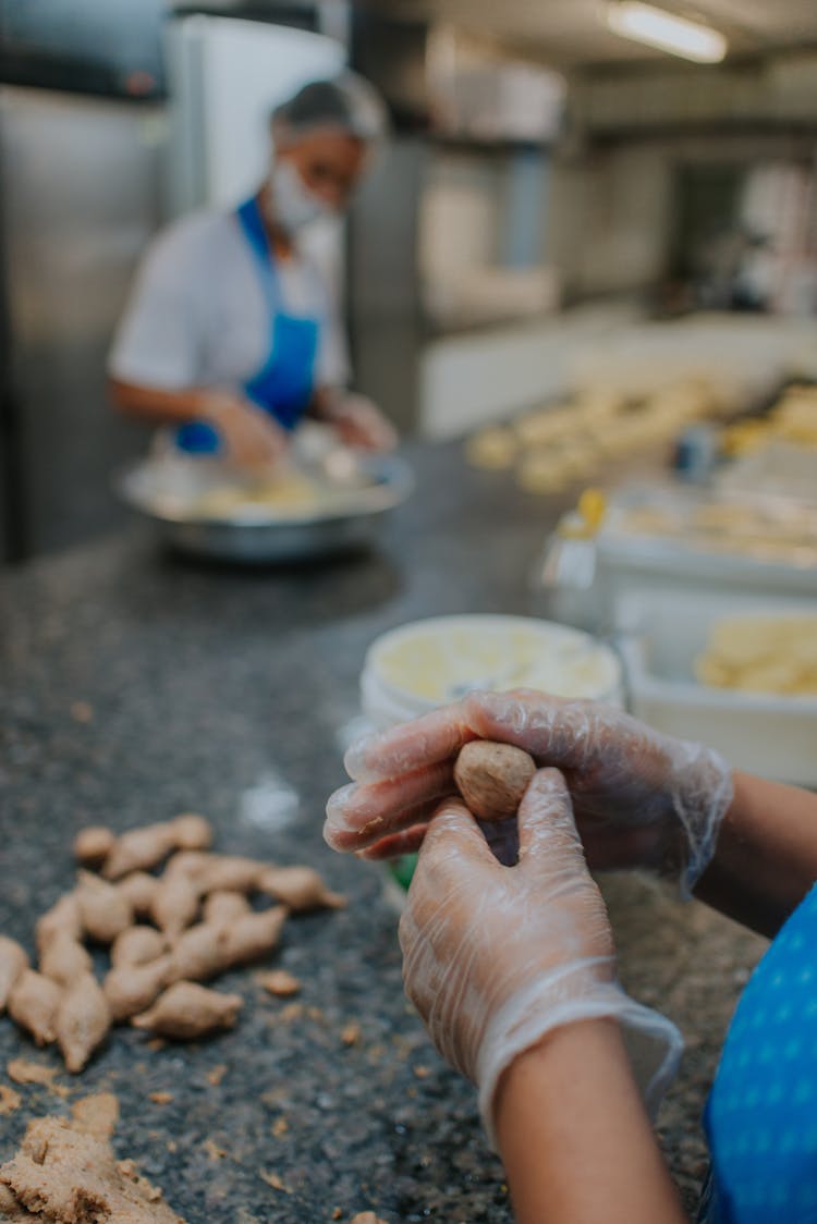 People Working At A Food Factory