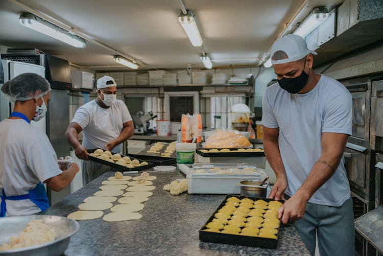 People Working In A Kitchen