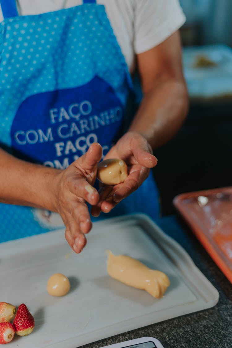 Hands Rolling Dough