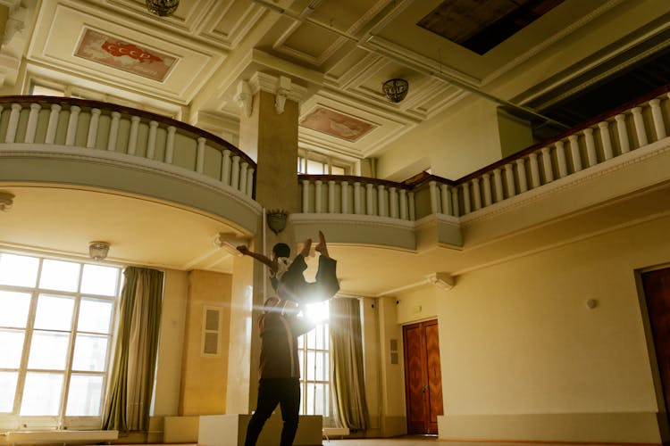 Couple Dancing In A Hall 