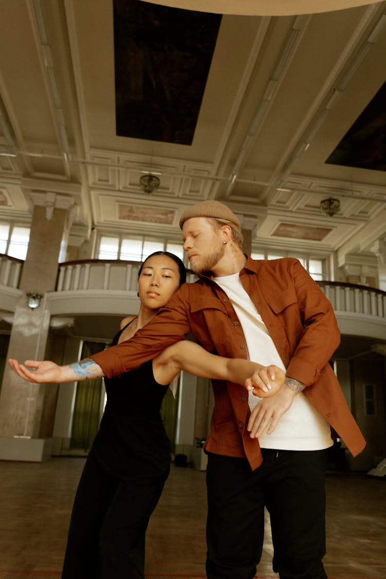 Couple Dancing In A Hall 