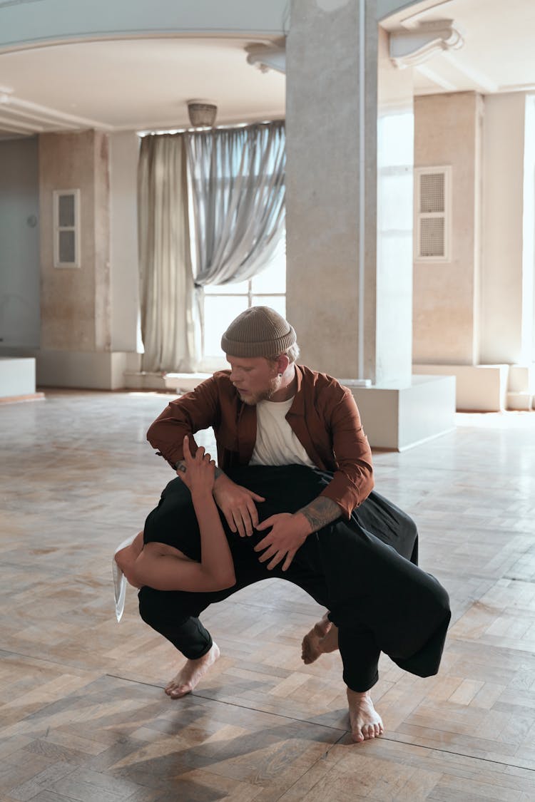 A Pair Of Dancers Dancing Barefooted