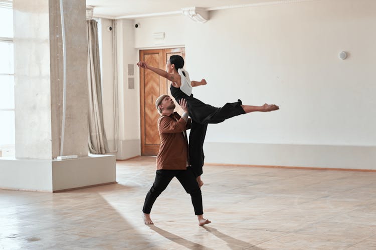 Man And Woman Dancing Ballet