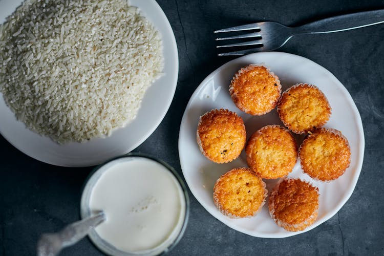 Overhead Shot Of Macaroons Near A Glass Of Milk