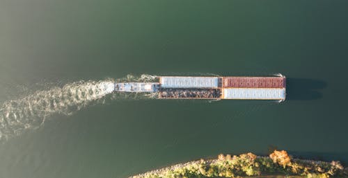 Barge Sailing on River