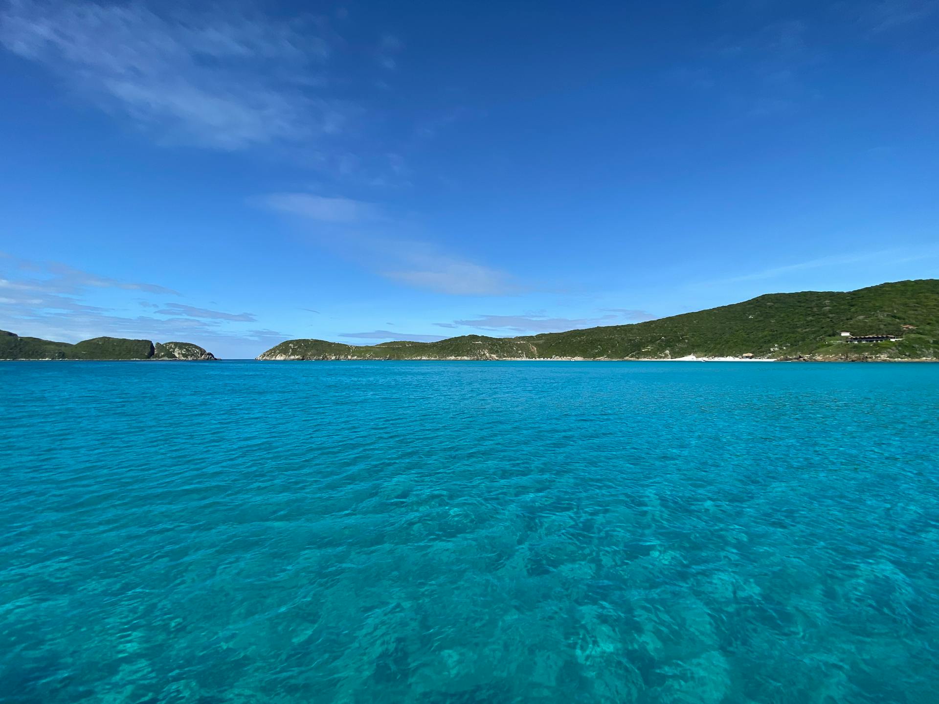 A breathtaking seascape with vibrant blue waters and clear skies, perfect for tranquility seekers.