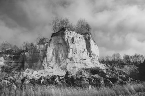 Free Rock Formation with Trees on it  Stock Photo