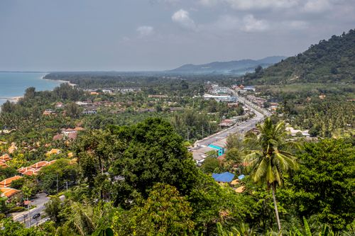 Free Discover the lush beauty of Phang-nga, Thailand, with its tropical beach, mountains, and vibrant town. Stock Photo