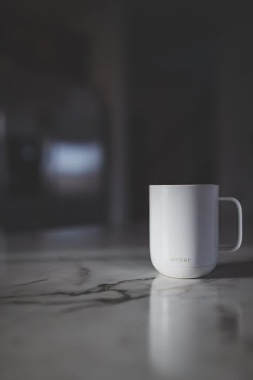 White Ceramic Mug on the Table