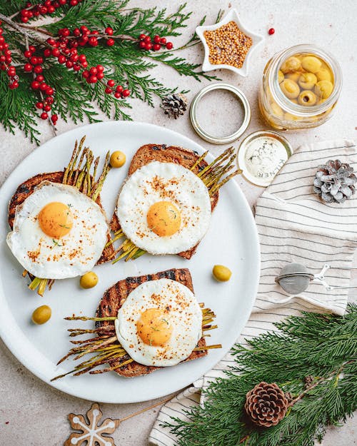 Free Toasts and Eggs with Asparagus for Christmas Breakfast Stock Photo