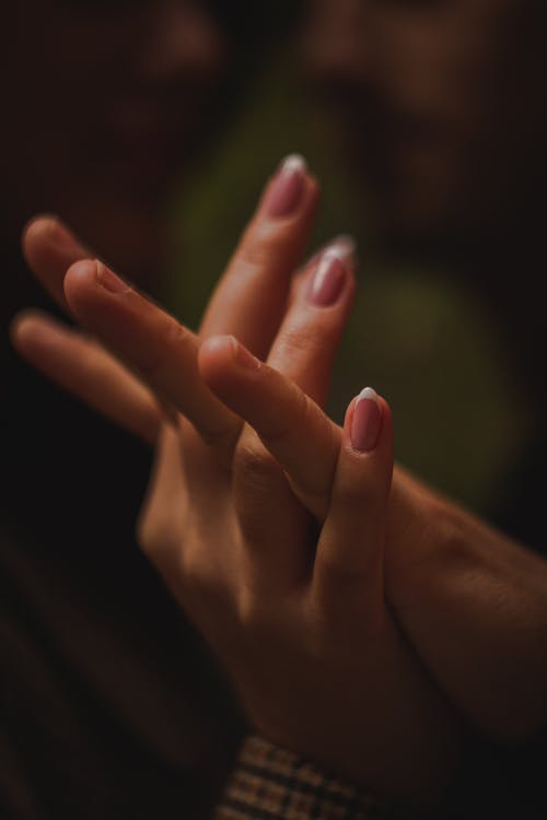 Free Holding Hands in Close-Up Shot Stock Photo